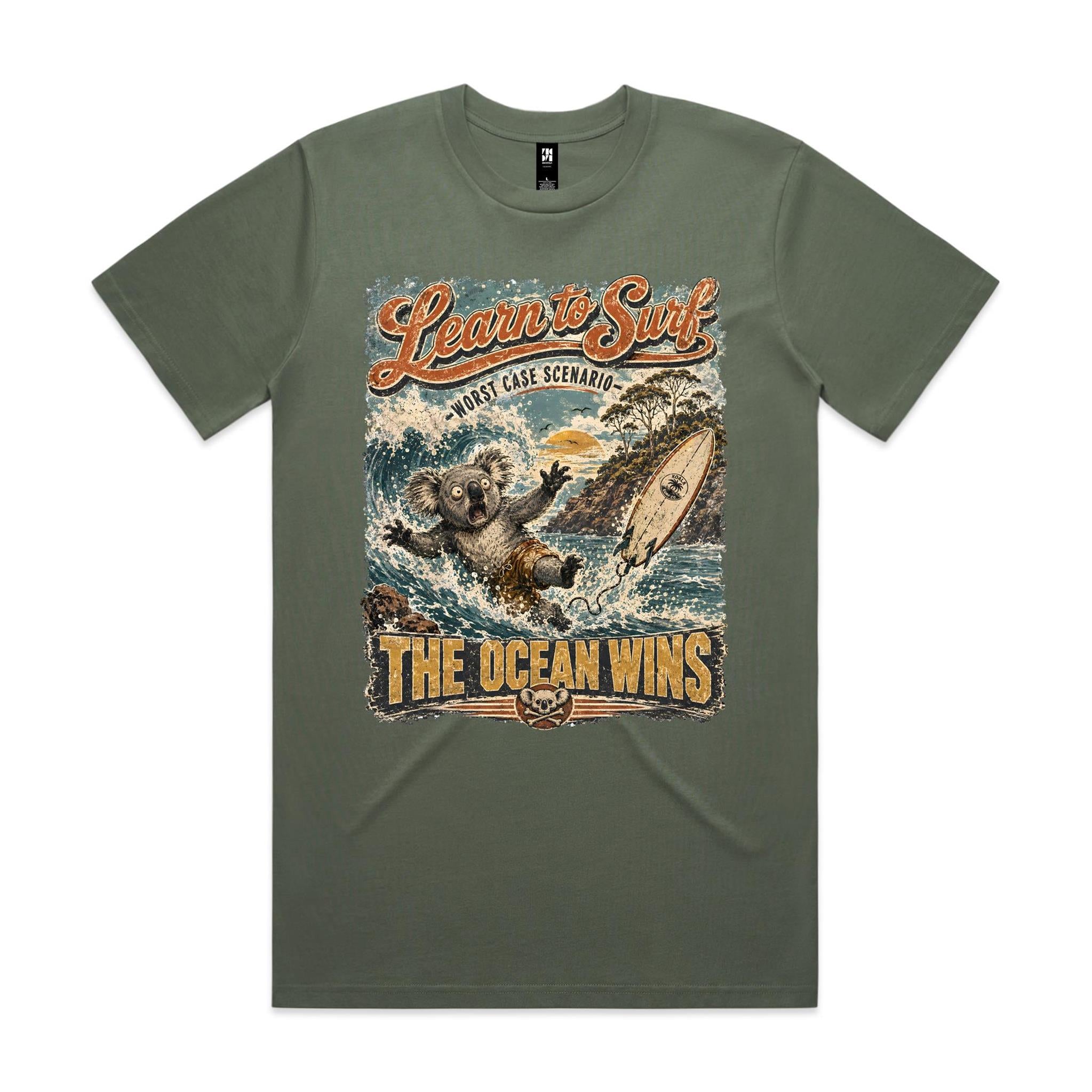 Learn to Surf — The Ocean Wins | Koala Surf Tee
